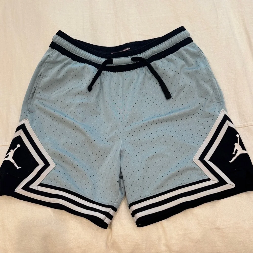 Jordan Men’s Light Blue Mesh Basketball Shorts with Black & White Accents